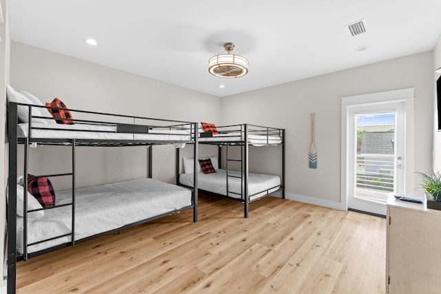 bedroom featuring light wood-type flooring