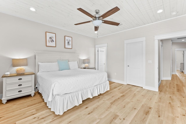 bedroom with ceiling fan, light hardwood / wood-style flooring, and crown molding