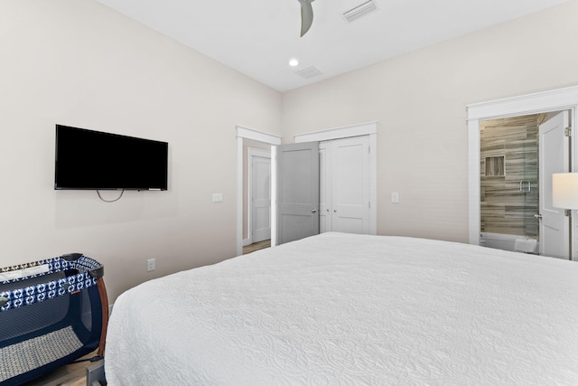 bedroom with ceiling fan and a closet