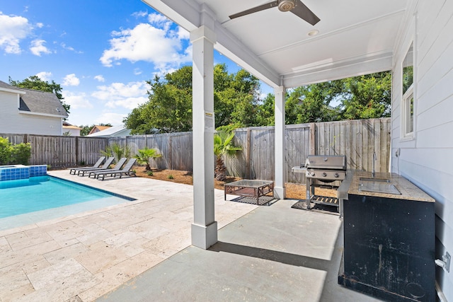 view of patio featuring ceiling fan, a grill, and a fenced in pool