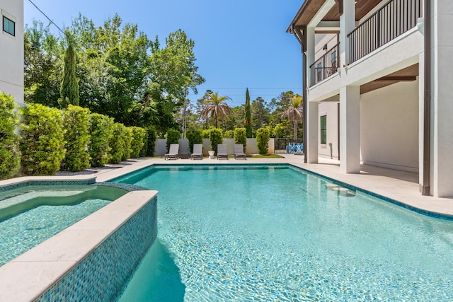 view of pool featuring a patio area