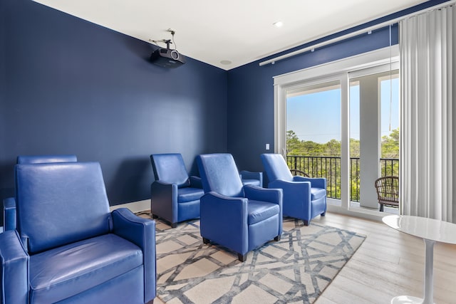 interior space featuring a wealth of natural light and hardwood / wood-style flooring