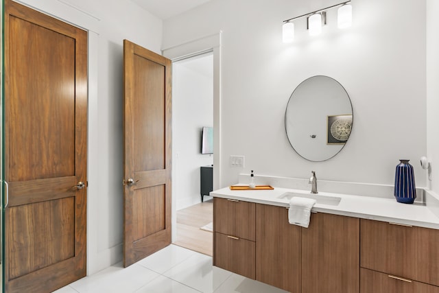 bathroom with wood-type flooring and vanity