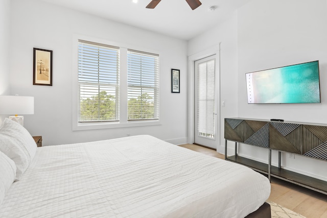 bedroom featuring light hardwood / wood-style floors and ceiling fan