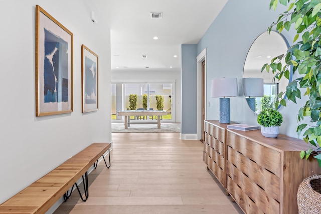 hall with light wood-type flooring