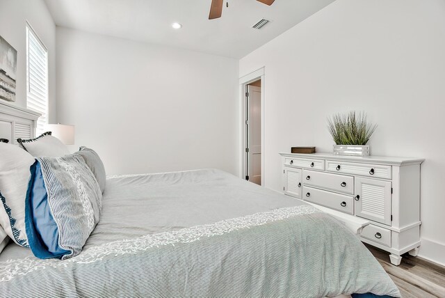 bedroom featuring ceiling fan and light wood-type flooring