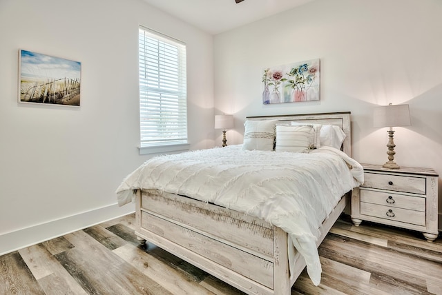 bedroom with wood-type flooring