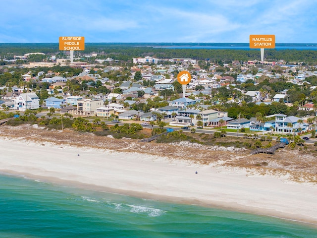 aerial view featuring a beach view and a water view