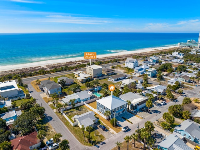 aerial view featuring a water view and a view of the beach