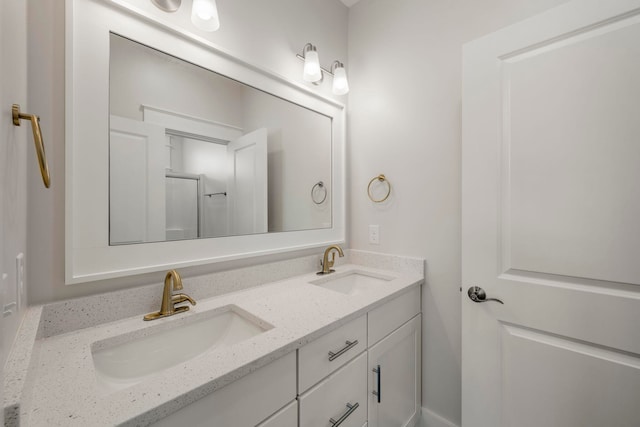 bathroom featuring dual bowl vanity