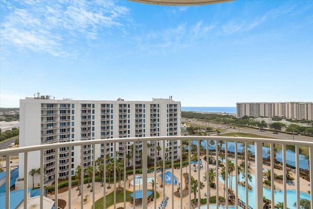 balcony featuring a water view