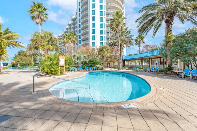 view of pool featuring a patio area