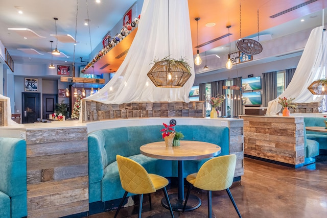 dining space with concrete floors