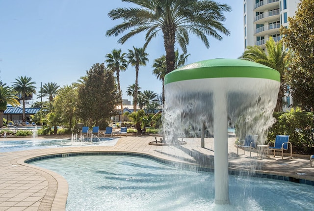 view of pool featuring pool water feature