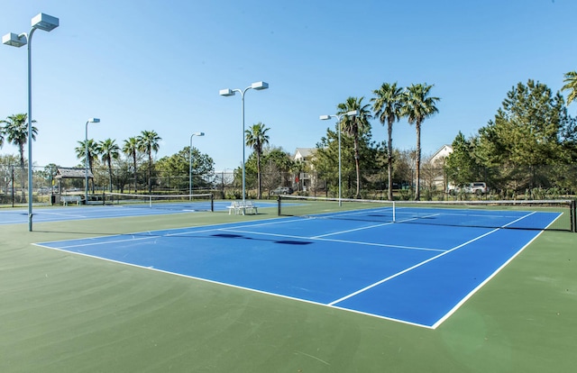 view of tennis court with basketball court