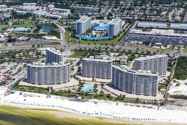 bird's eye view with a view of the beach and a water view