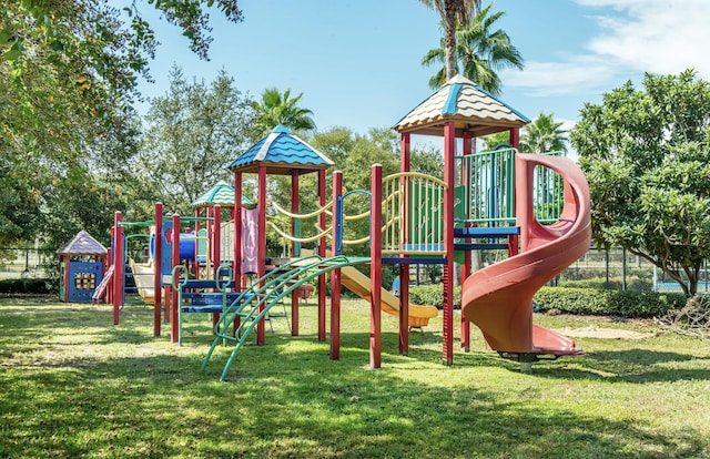 view of playground featuring a lawn