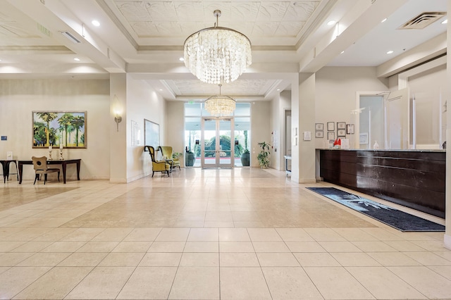 reception area featuring a chandelier