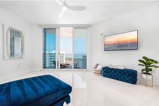 tiled bedroom with access to exterior and ceiling fan