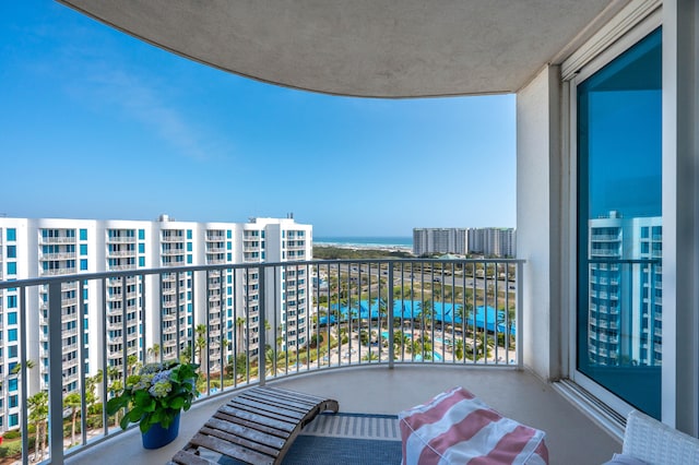 balcony featuring a water view