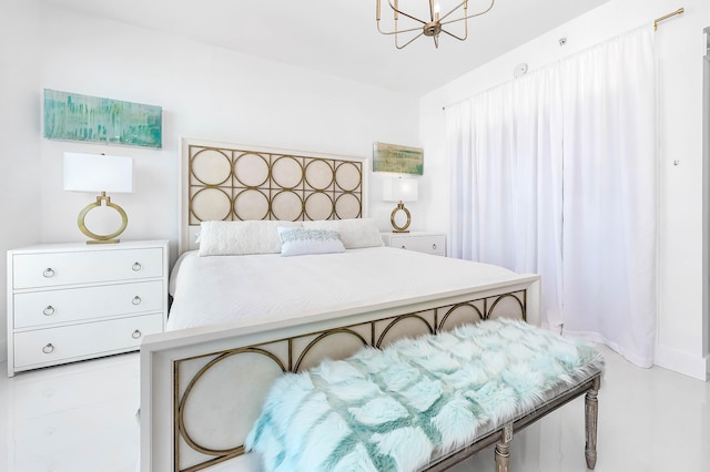 bedroom featuring a chandelier