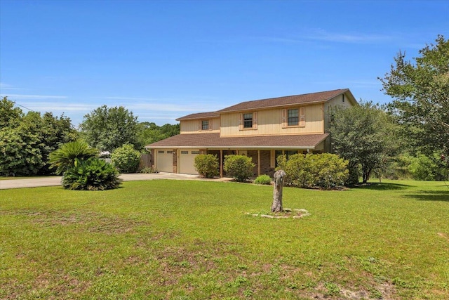 view of front facade featuring a front yard and a garage