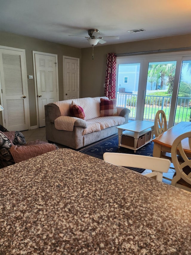 living room with ceiling fan