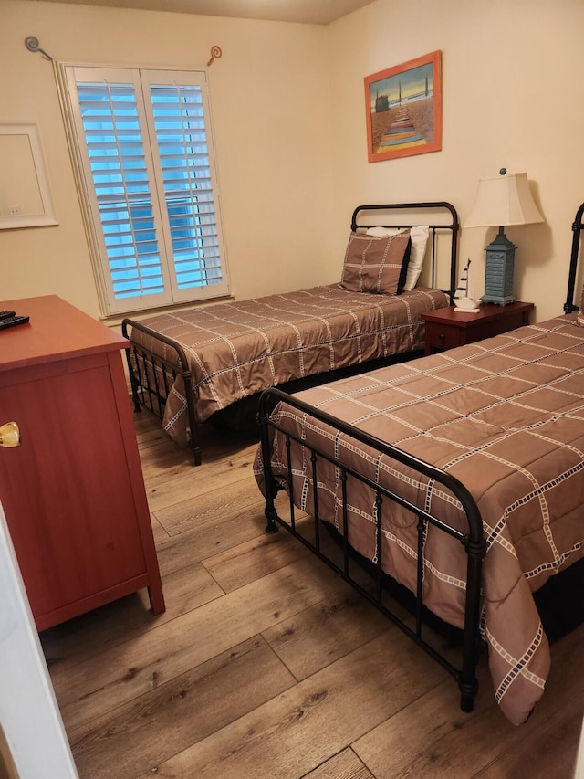 bedroom featuring hardwood / wood-style flooring