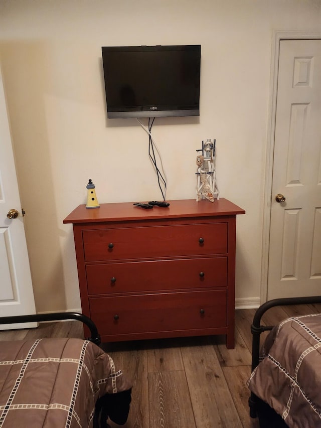 bedroom featuring hardwood / wood-style flooring