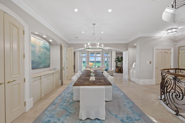 dining space featuring arched walkways, a notable chandelier, crown molding, light tile patterned floors, and recessed lighting