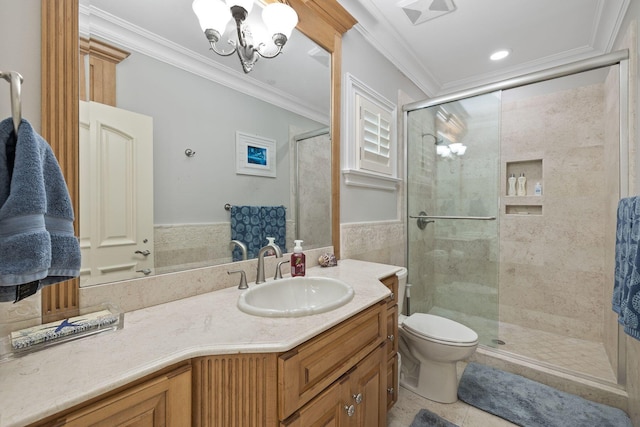 full bathroom featuring ornamental molding, a shower stall, vanity, and an inviting chandelier