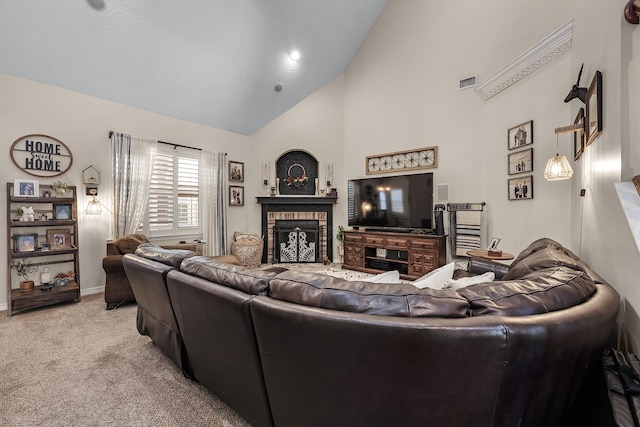 carpeted living room featuring high vaulted ceiling and a fireplace