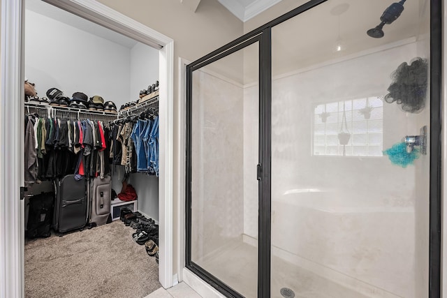 bathroom featuring walk in shower and ornamental molding