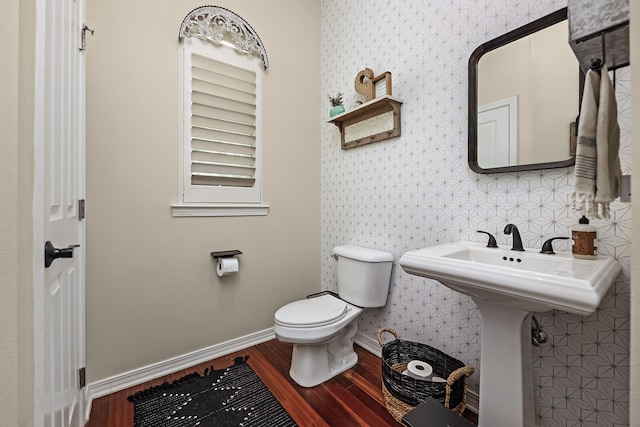 bathroom featuring tile floors and toilet