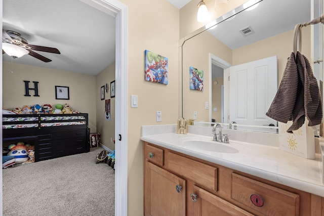 bathroom featuring ceiling fan and vanity