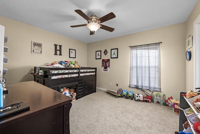 carpeted bedroom with ceiling fan