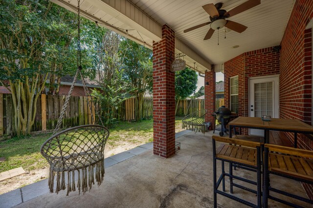 view of patio featuring ceiling fan and area for grilling