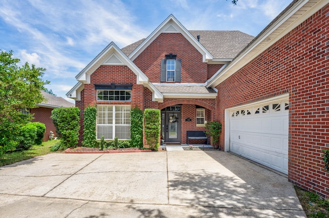 view of front of home with a garage