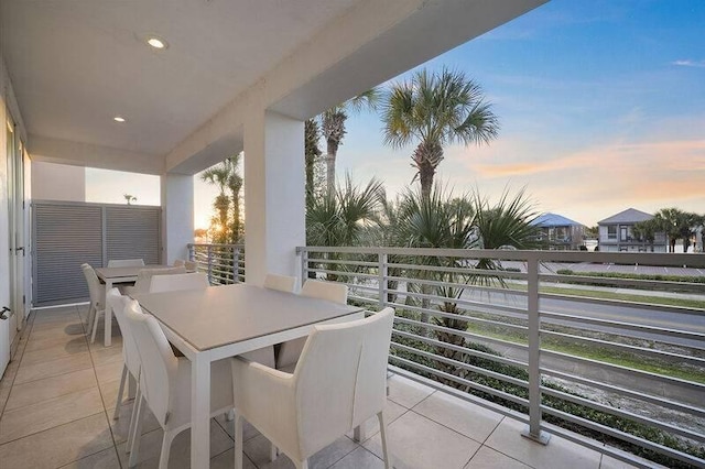 patio terrace at dusk with a balcony