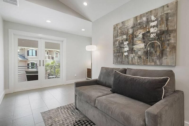 tiled living room with vaulted ceiling