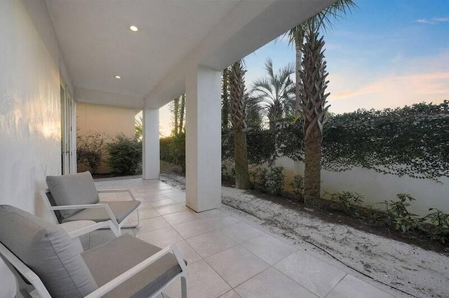 view of patio terrace at dusk