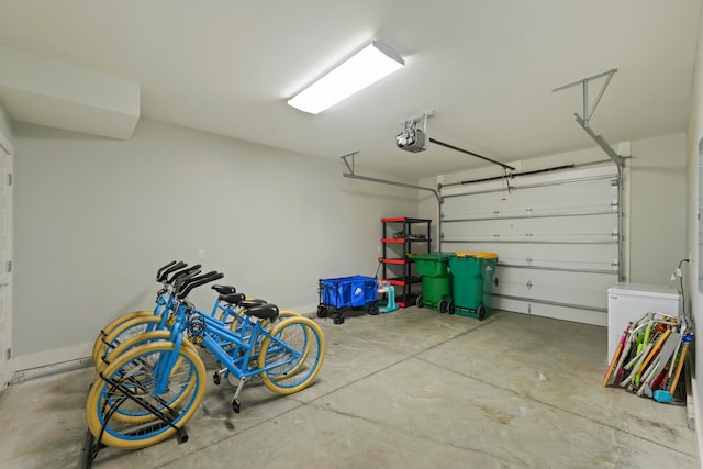 garage featuring a garage door opener