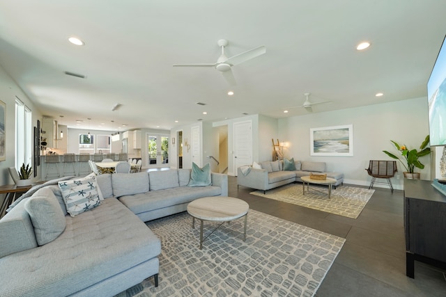 living room with ceiling fan