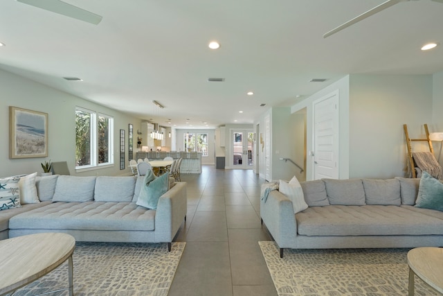 living room with tile flooring