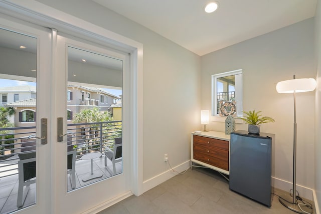 interior space featuring tile flooring and french doors