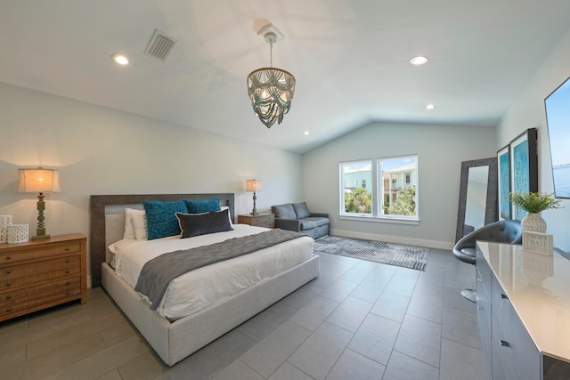 bedroom featuring tile flooring, vaulted ceiling, and an inviting chandelier