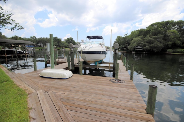 dock area featuring a water view and boat lift