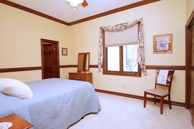 bedroom featuring baseboards, carpet, and crown molding