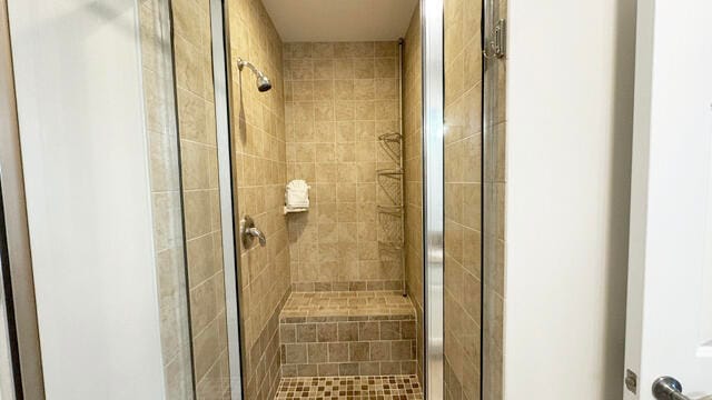 bathroom featuring walk in shower