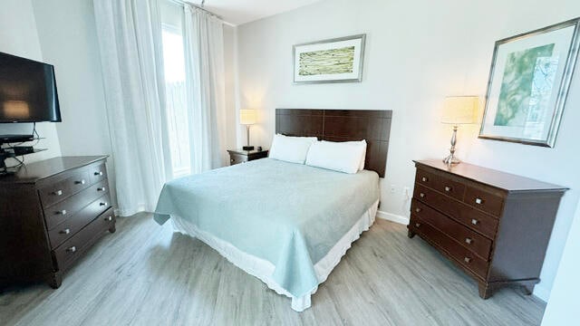 bedroom featuring light wood-type flooring